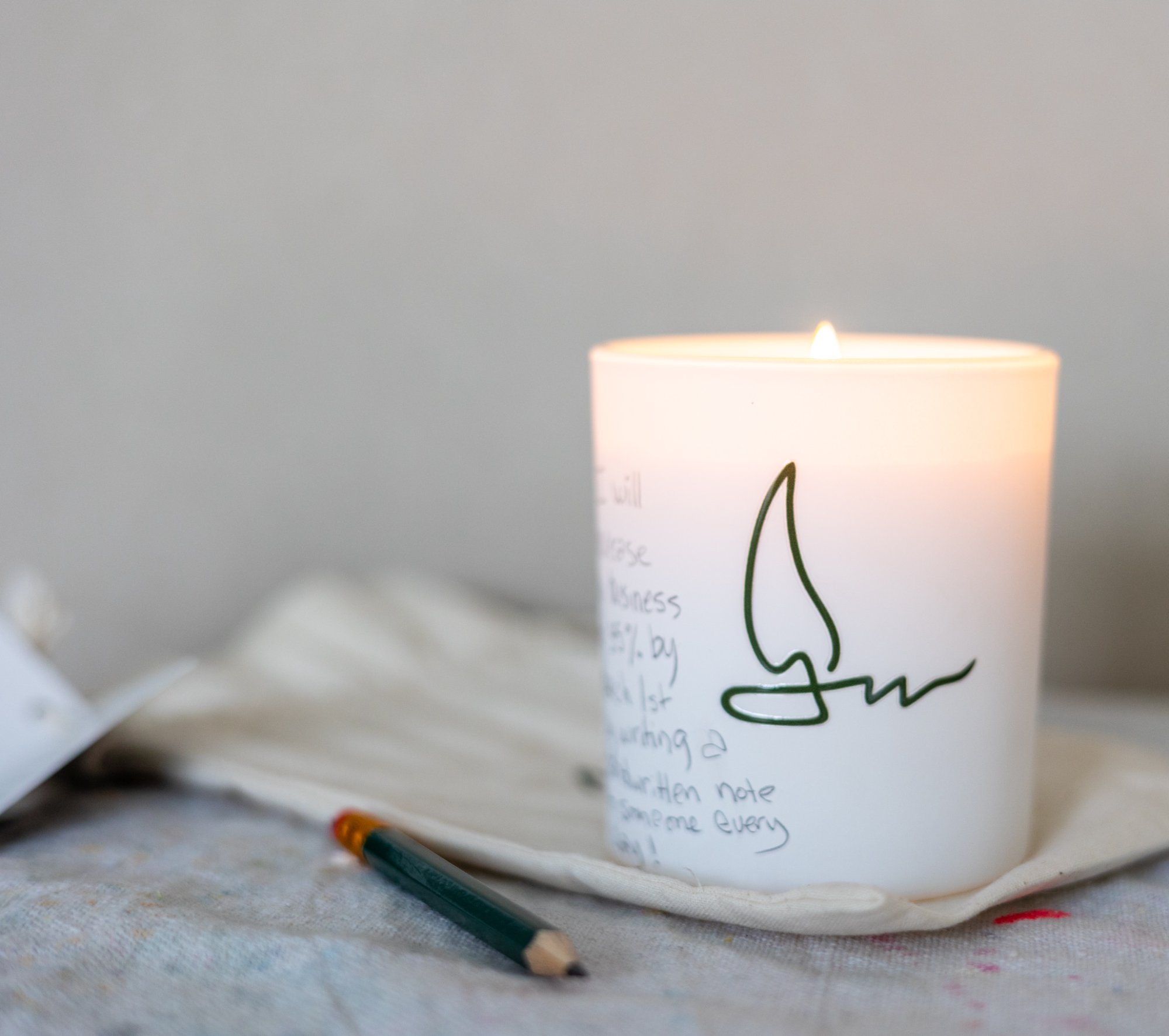 Lit candle with intention